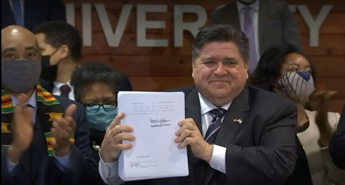 Pritzker with bill